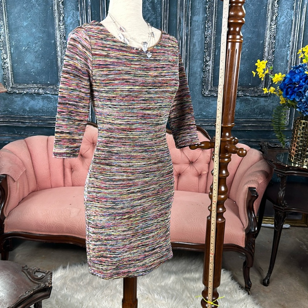 Eye catching bodycon dress, deep gemstones and silky shimmer
